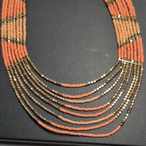 Elegant Coral and Gold Beaded Necklace